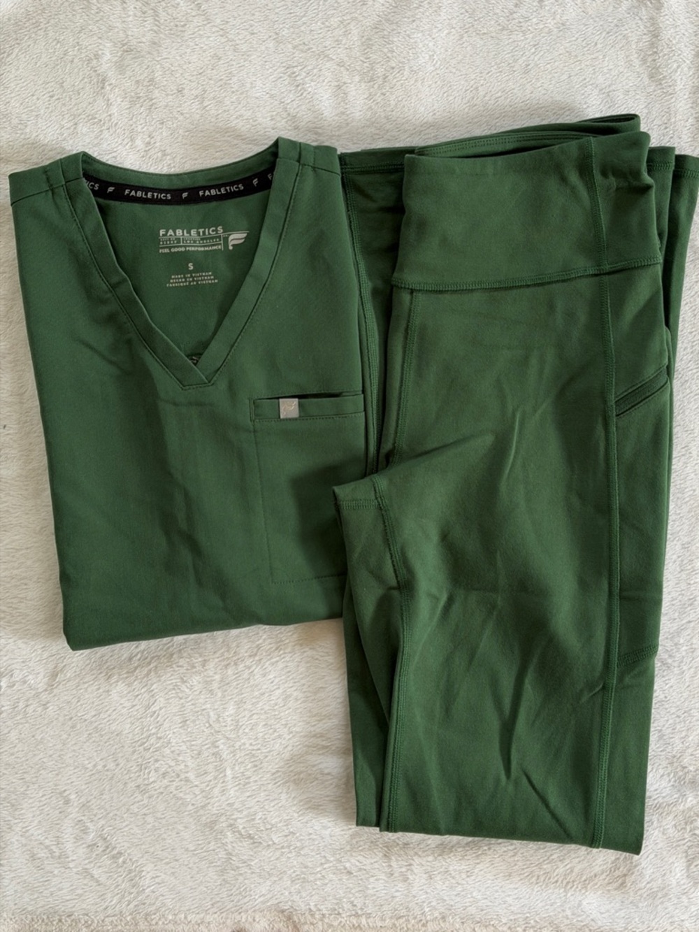 Fabletics scrubs set in Hunter Green
